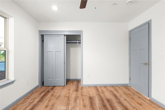8412 Montna Dr, Paradise, CA 95969 - unfurnished bedroom featuring light wood-style flooring, a closet, recessed lighting, and a ceiling fan