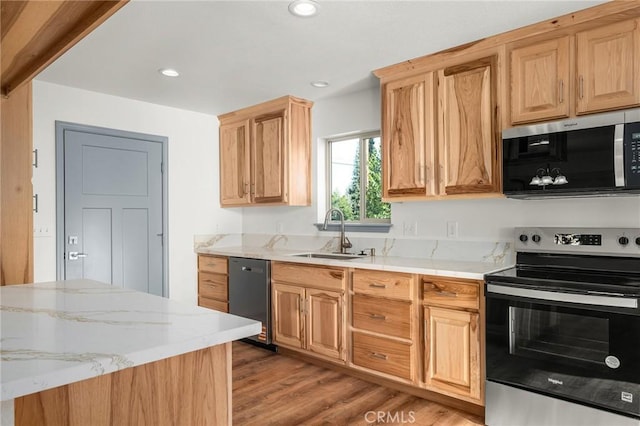 8412 Montna Dr, Paradise, CA 95969 - kitchen with appliances with stainless steel finishes, light wood finished floors, recessed lighting, light stone counters, and light brown cabinets