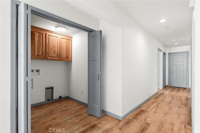 8412 Montna Dr, Paradise, CA 95969 - laundry room with cabinet space, washer hookup, light wood-style flooring, and recessed lighting