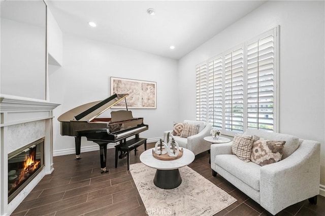 632 Hartwell Ct, Altadena, CA 91001 - sitting room featuring a glass covered fireplace, recessed lighting, and dark wood finished floors