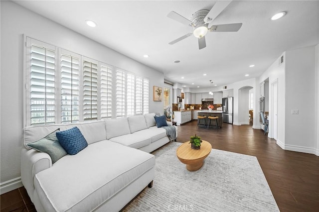 632 Hartwell Ct, Altadena, CA 91001 - living area featuring a ceiling fan, plenty of natural light, arched walkways, recessed lighting, and dark wood-style flooring