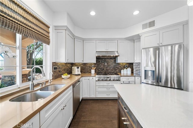 632 Hartwell Ct, Altadena, CA 91001 - kitchen featuring stainless steel appliances, decorative backsplash, light countertops, recessed lighting, and dark wood-style floors