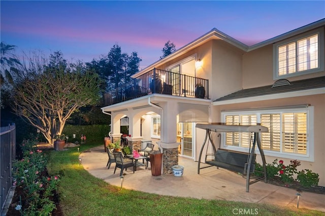 632 Hartwell Ct, Altadena, CA 91001 - back of property featuring a balcony, stucco siding, and a patio