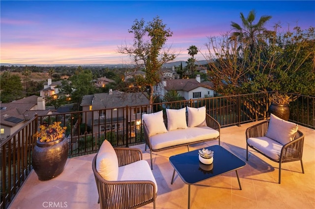 632 Hartwell Ct, Altadena, CA 91001 - patio terrace at dusk with an outdoor living space and a balcony
