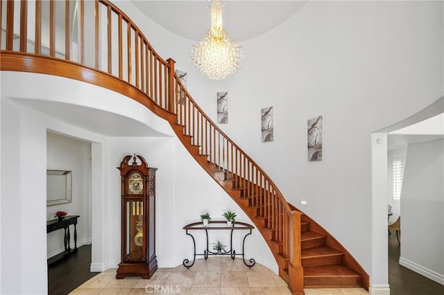 632 Hartwell Ct, Altadena, CA 91001 - stairway featuring a high ceiling and a chandelier