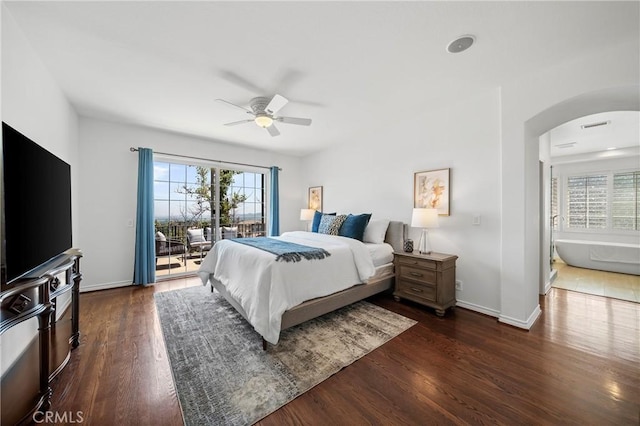 632 Hartwell Ct, Altadena, CA 91001 - bedroom featuring arched walkways, access to outside, multiple windows, and dark wood finished floors