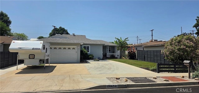 20450 Bassett St, Winnetka, CA 91306 - ranch-style house featuring an attached garage and concrete driveway