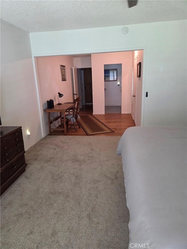 20450 Bassett St, Winnetka, CA 91306 - carpeted bedroom featuring a textured ceiling