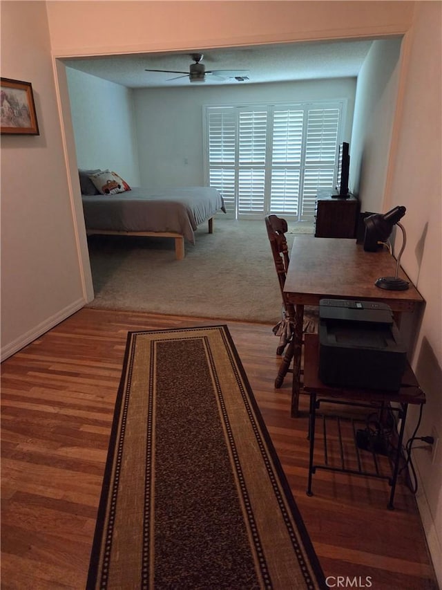 20450 Bassett St, Winnetka, CA 91306 - bedroom featuring wood finished floors and baseboards