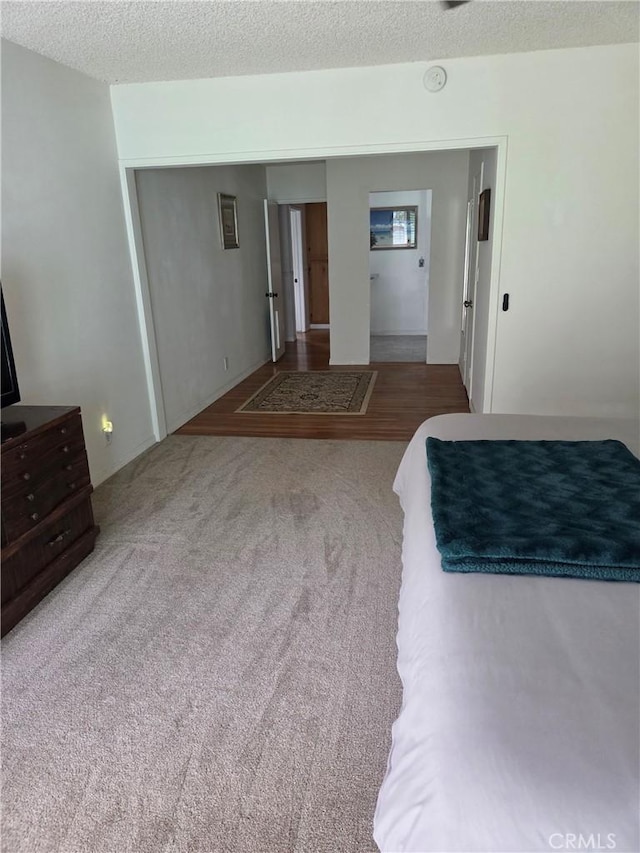 20450 Bassett St, Winnetka, CA 91306 - bedroom with a textured ceiling and carpet flooring