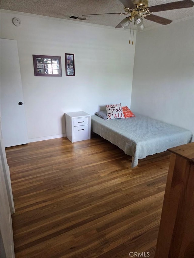 20450 Bassett St, Winnetka, CA 91306 - bedroom with dark wood-style floors and ceiling fan