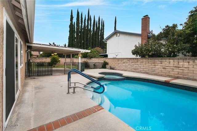 10025 Lubao Ave, Chatsworth, CA 91311 - view of swimming pool with a pool with connected hot tub, a fenced backyard, and a patio