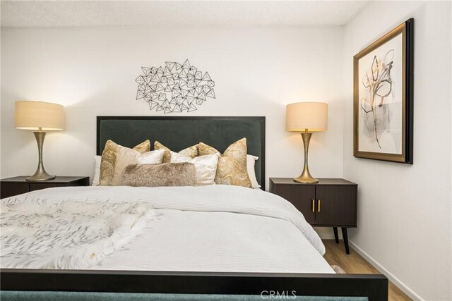 38 Woodleaf, Irvine, CA 92614 - bedroom with wood finished floors and baseboards