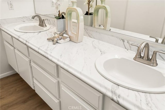 38 Woodleaf, Irvine, CA 92614 - bathroom featuring double vanity and wood finished floors