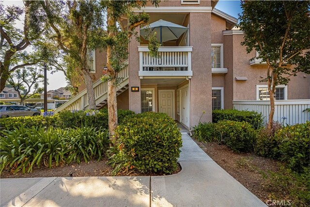 38 Woodleaf, Irvine, CA 92614 - multi unit property with stucco siding and stairs