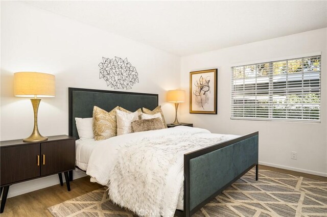 38 Woodleaf, Irvine, CA 92614 - bedroom featuring wood finished floors and baseboards