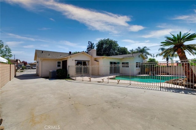 1333 E Tudor St, Covina, CA 91724 - back of house featuring stucco siding, a patio, and a gate