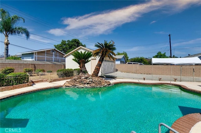 1333 E Tudor St, Covina, CA 91724 - view of swimming pool with a fenced backyard