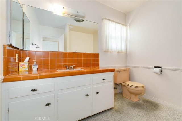 1333 E Tudor St, Covina, CA 91724 - bathroom with vanity and decorative backsplash