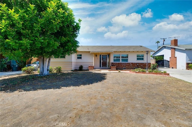1333 E Tudor St, Covina, CA 91724 - view of front of house with driveway and brick siding