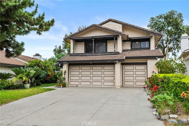 25835 Appian Way, Mission Viejo, CA 92691 - view of front facade featuring a garage, concrete driveway, and stucco siding