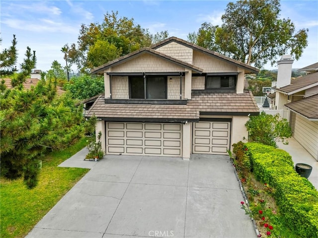 25835 Appian Way, Mission Viejo, CA 92691 - view of front of home with a garage, stucco siding, and driveway