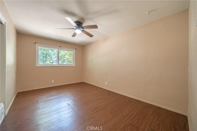 1577 Hawthorne Ave, Chico, CA 95926 - spare room with dark wood-style floors and ceiling fan