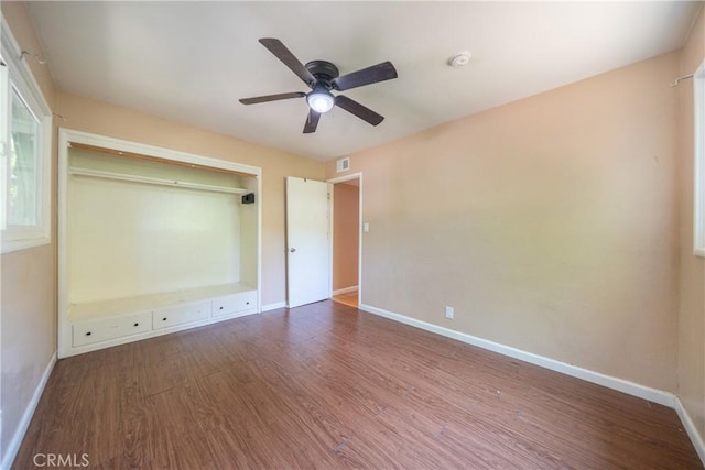 1577 Hawthorne Ave, Chico, CA 95926 - unfurnished bedroom with wood finished floors, a ceiling fan, and a closet