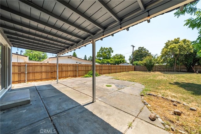 1577 Hawthorne Ave, Chico, CA 95926 - fenced backyard with a patio area