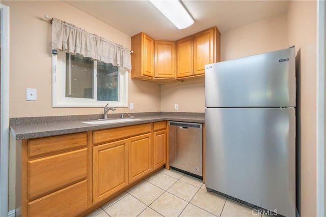1577 Hawthorne Ave, Chico, CA 95926 - kitchen featuring stainless steel appliances, dark countertops, and light tile patterned floors