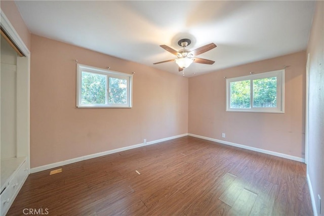 1577 Hawthorne Ave, Chico, CA 95926 - unfurnished bedroom featuring wood finished floors, a closet, and a ceiling fan