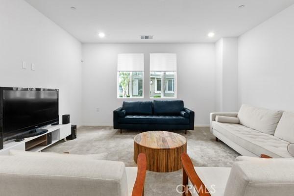 15940 Lasselle St Unit 1, Moreno Valley, CA 92551 - carpeted living room featuring recessed lighting