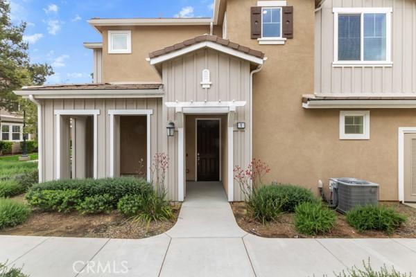 15940 Lasselle St Unit 1, Moreno Valley, CA 92551 - entrance to property featuring board and batten siding and stucco siding