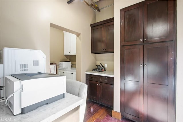 201 E Broadway, Long Beach, CA 90802 - kitchen featuring dark wood-style flooring, dark brown cabinets, and light countertops