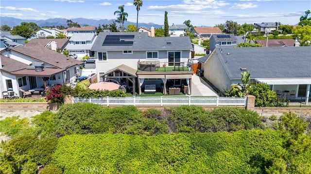 21751 Lanar, Mission Viejo, CA 92692 - back of property with a residential view, a fenced backyard, a mountain view, and stucco siding
