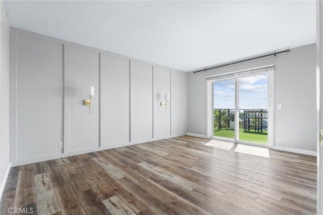 21751 Lanar, Mission Viejo, CA 92692 - unfurnished bedroom with access to exterior and wood finished floors