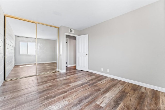 21751 Lanar, Mission Viejo, CA 92692 - unfurnished bedroom featuring wood finished floors and a closet