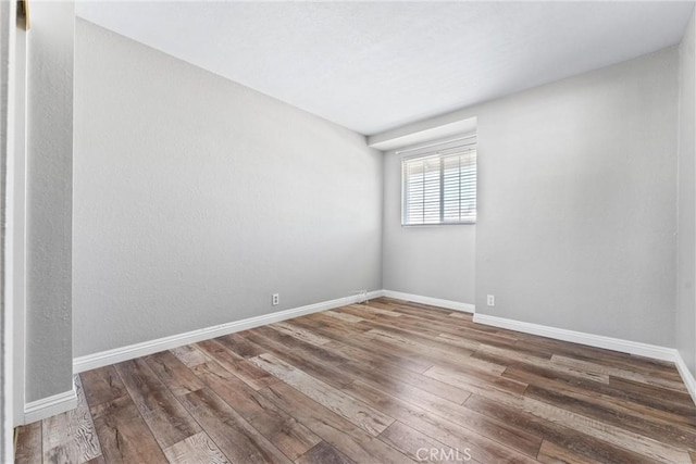 21751 Lanar, Mission Viejo, CA 92692 - spare room featuring wood finished floors and baseboards