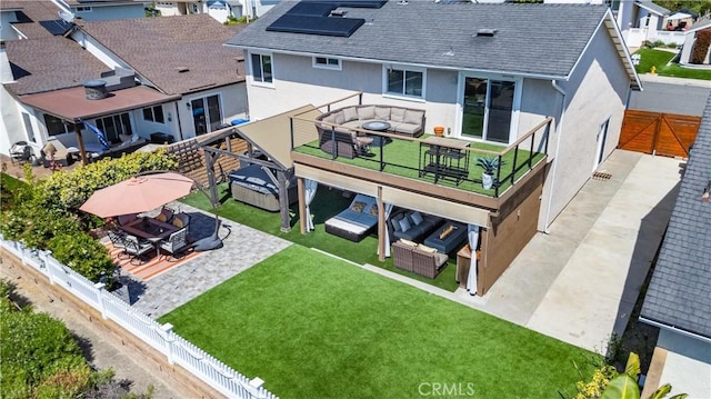 21751 Lanar, Mission Viejo, CA 92692 - back of property featuring an outdoor living space, stucco siding, and a fenced backyard