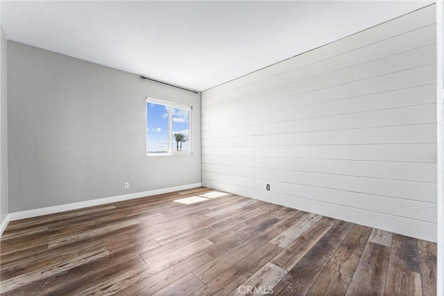 21751 Lanar, Mission Viejo, CA 92692 - spare room featuring dark wood-style floors and baseboards