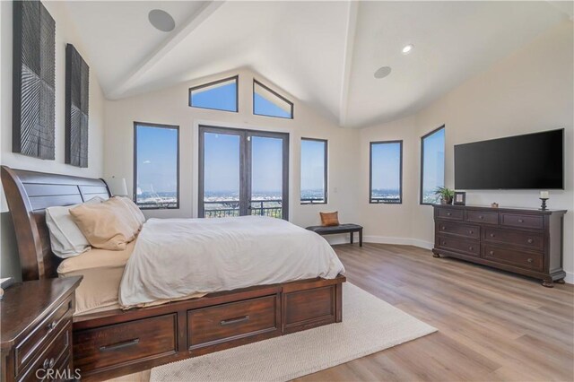 14757 Rockhill Dr, Hacienda Heights, CA 91745 - bedroom featuring multiple windows, light wood finished floors, access to outside, and vaulted ceiling