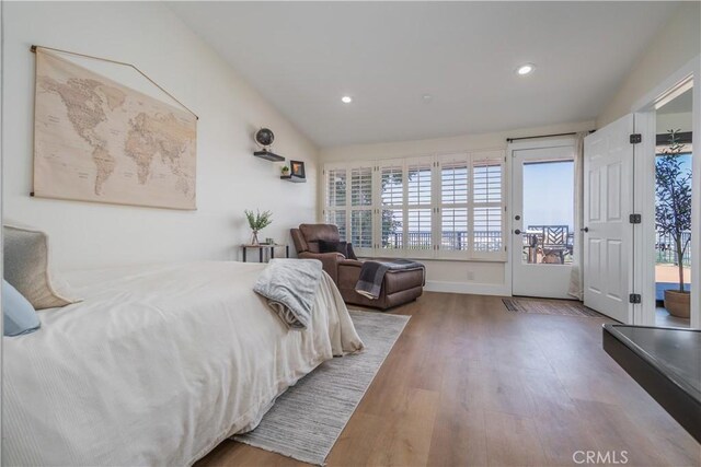 14757 Rockhill Dr, Hacienda Heights, CA 91745 - bedroom with access to outside, wood finished floors, multiple windows, recessed lighting, and vaulted ceiling