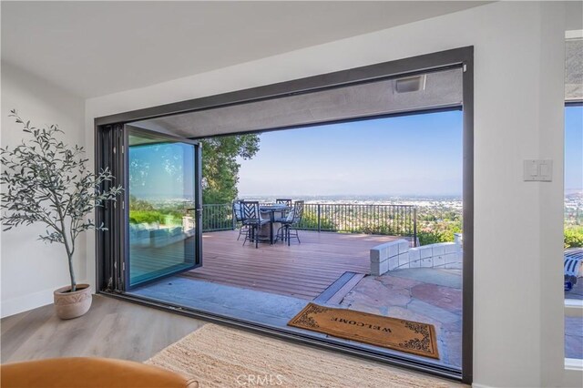 14757 Rockhill Dr, Hacienda Heights, CA 91745 - doorway with wood finished floors and healthy amount of natural light
