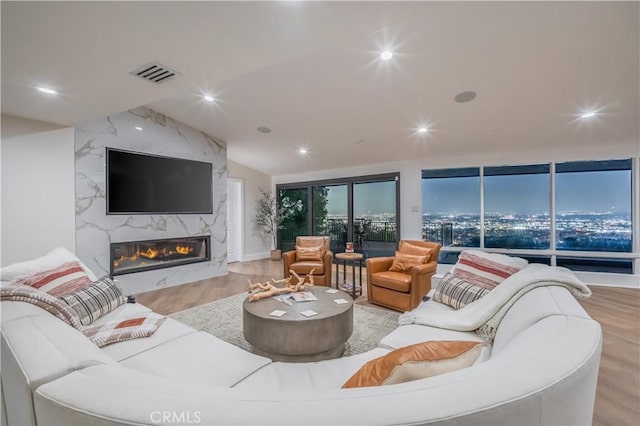 14757 Rockhill Dr, Hacienda Heights, CA 91745 - living area featuring wood finished floors, a high end fireplace, and recessed lighting