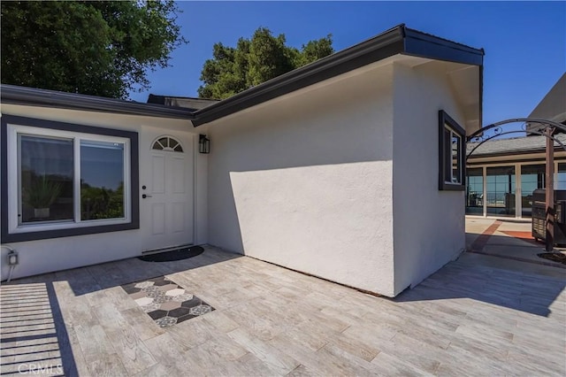 14757 Rockhill Dr, Hacienda Heights, CA 91745 - entrance to property featuring stucco siding and a patio