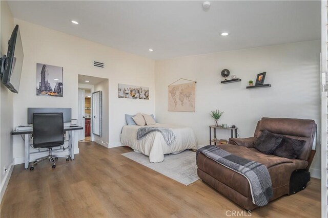 14757 Rockhill Dr, Hacienda Heights, CA 91745 - bedroom with a desk, wood finished floors, and recessed lighting