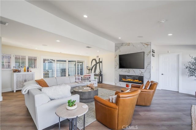 14757 Rockhill Dr, Hacienda Heights, CA 91745 - living area featuring wood finished floors, a high end fireplace, and recessed lighting