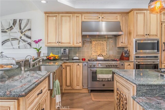 14757 Rockhill Dr, Hacienda Heights, CA 91745 - kitchen featuring stainless steel appliances, extractor fan, decorative backsplash, and dark stone counters