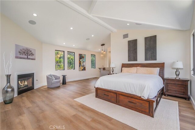 14757 Rockhill Dr, Hacienda Heights, CA 91745 - bedroom with light wood-style flooring, a glass covered fireplace, and recessed lighting