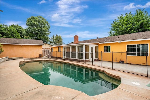 20129 Halsted St, Chatsworth, CA 91311 - view of swimming pool with a patio area and a sunroom